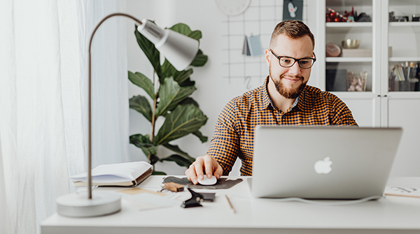 Happy guy on a laptop