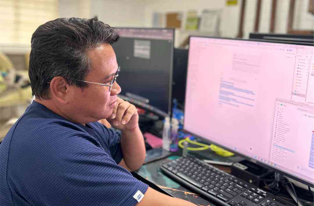 Client manager and design lead reviewing a project before it ships to an agency partner