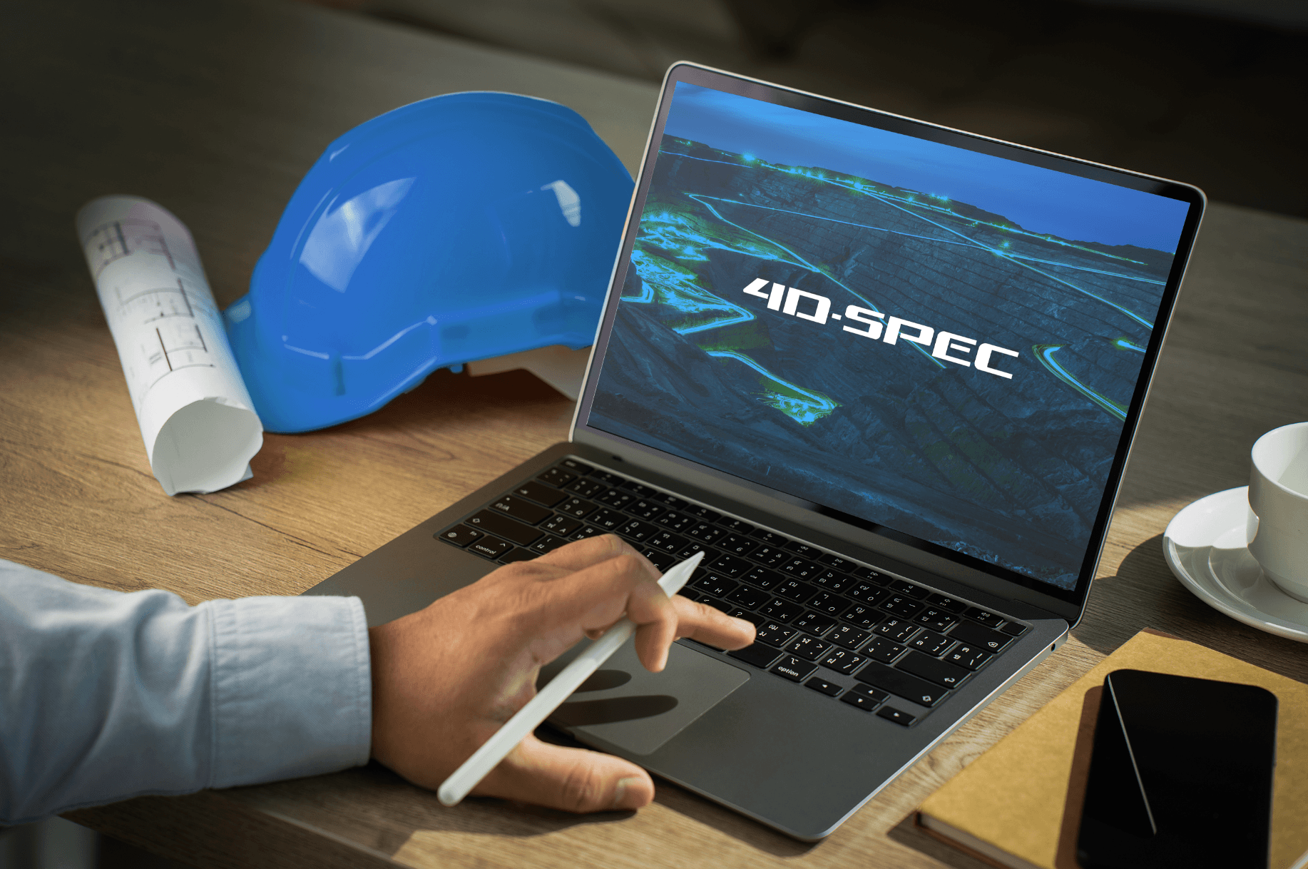 Laptop displaying 4D-SPEC logo over topographic mine site visualization — mining technology brand website design mockup