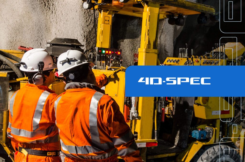 Two mining engineers in high-visibility orange PPE and hard hats operating yellow mining machinery underground — 4D-SPEC logo displayed in brand blue overlay