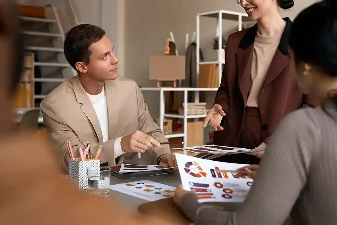 Creative Director and team reviewing brand strategy before design work begins